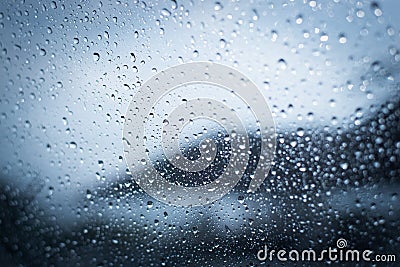 Rainy days,Rain drops on window,rainy weather,rain background Stock Photo