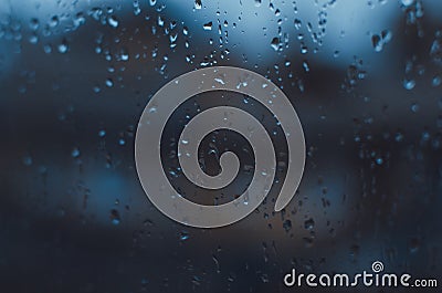 Rainy days,Rain drops on window,rainy weather,rain background,rain and bokeh Stock Photo