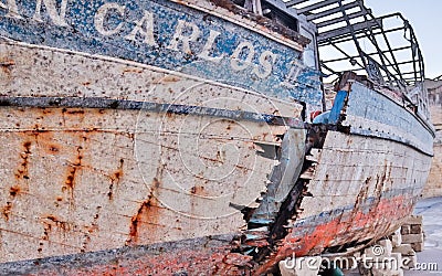 Raise, old, broken Ship Wreck of San Carlos near yacht harbour Stock Photo