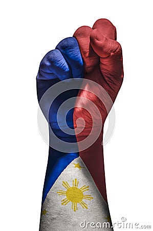 Raised fist painted in Philippine Flag. Showing strong and love for the country. Stock Photo