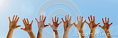 Raised hands Stock Photo