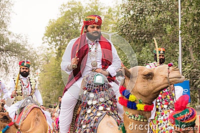 Rajasthani man on a camel Editorial Stock Photo
