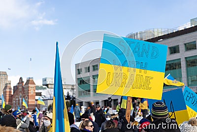 Rally in support of Ukraine against war. Protest and march against Russian invasion. Editorial Stock Photo