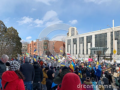 Rally in support of Ukraine against war. Protest and march against Russian invasion. Editorial Stock Photo