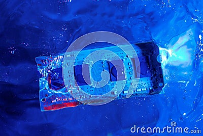 RAM memory from a laptop, ram. Blue and red light, under water. Technology of cyber-electronic concept. Technological background Stock Photo