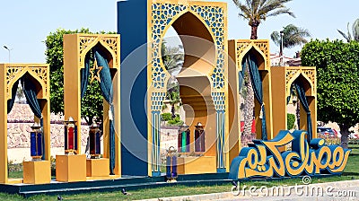 Ramadan festive decorations in the streets of Egypt, Islamic gates with curtains and Arabic lamps and lanterns Editorial Stock Photo