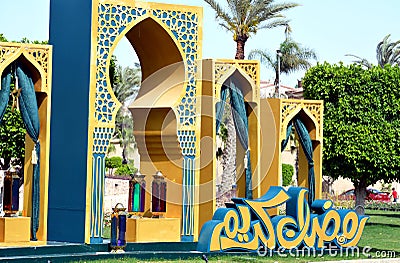 Ramadan festive decorations in the streets of Egypt, Islamic gates with curtains and Arabic lamps and lanterns Editorial Stock Photo