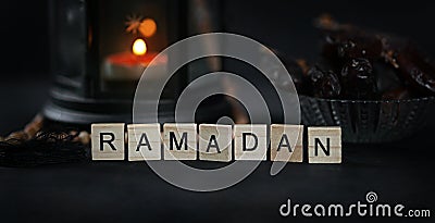 Ramadan Greeting Scrabble Letters. Ramadan Candle Lantern with W Stock Photo