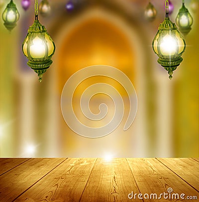 Ramadan background.Mosque window with lantern lightning and wooden table Stock Photo