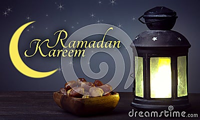 Ramadan Kareem celebration with lanterns and Dried date palm fruits ramazan food Stock Photo