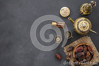 Ramadan kareem with dried dates and authentic metal zamzam water carafe Stock Photo