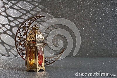 Ramadan Kareem. golden moon and lantern on glowing background for Holy month Ramadan celebration Stock Photo