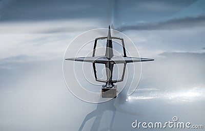 Vintage Lincoln Continental hood ornament on white background Editorial Stock Photo