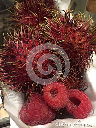 The Red and hairy Rambutan Fruit Stock Photo