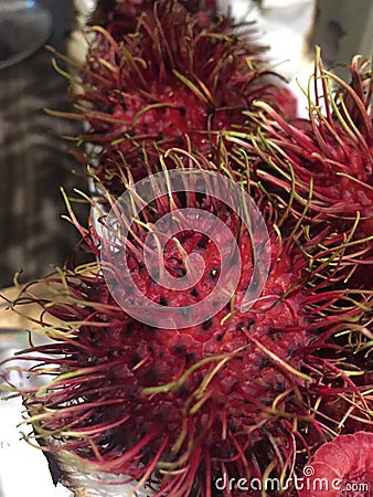 The Red and hairy Rambutan Fruit Stock Photo