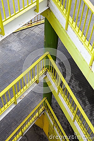 Ramp with several floors. Yellow railing. Stock Photo