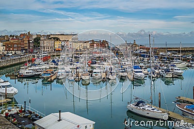 Yachts moored in the marina of the impressive historic Royal Harbour Editorial Stock Photo