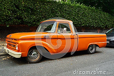 Ramsgate, United Kingdom - June 29, 2021: A mid sixties orange Ford F100 Pickup Truck Editorial Stock Photo