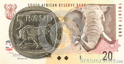 5 rand coin against 20 south african rand bank note obverse Stock Photo