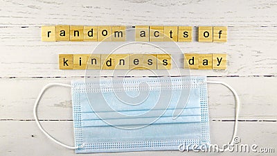Random Acts of Kindness Day.words from wooden cubes with letters photo. Stock Photo