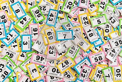 A random array of multicoloured raffle tickets Stock Photo