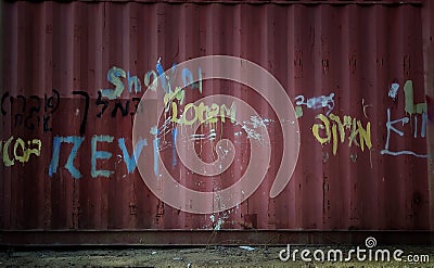 Random graffiti on a wall of a cargo crate Stock Photo