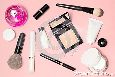 Concept of a white and black cosmetic supplies. Top view on pink background Stock Photo