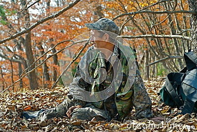 Ranger in autumn forest 5 Stock Photo