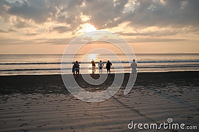 People are visiting at tropical paradise beach on Aow Yai Beach during sunset time in Ko Phayam island. Editorial Stock Photo