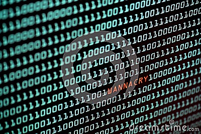 Ransomware or Wannacry text and binary code concept from the desktop computer screen, selective focus, Security Technology Stock Photo