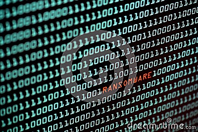 Ransomware or Wannacry text and binary code concept from the desktop computer screen, selective focus, Security Technology Stock Photo