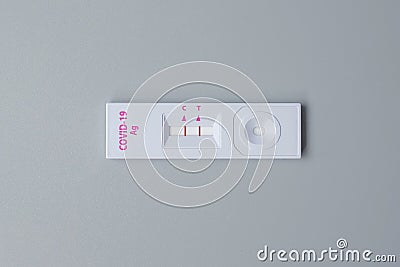 Rapid Antigen Test kit with Positive result during swab COVID-19 testing. Coronavirus Self nasal or Home test, Lockdown and Home Stock Photo