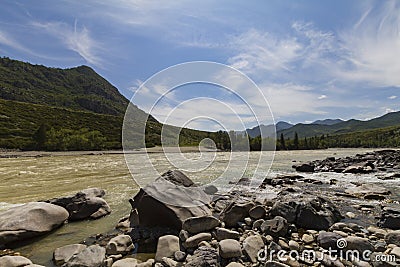 Rapid current of the Chuya River in Mountains Altai Stock Photo