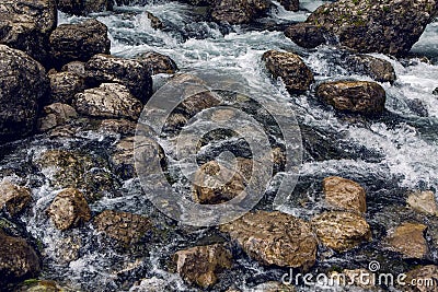 Rapid stream with rocks and moss Stock Photo