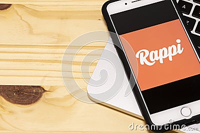 Rappi logo on the mobile device. Rappi is an on-demand delivery startup active in Argentina, Brazil, Chile, Colombia, Mexico, Peru Editorial Stock Photo