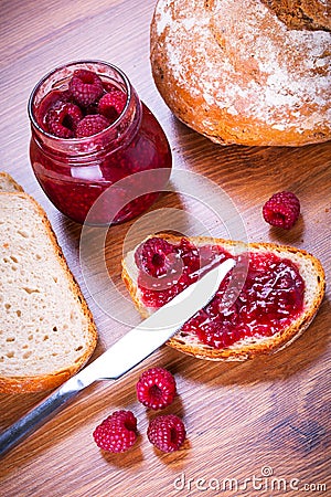 Rapsberry jam with slice of bread Stock Photo