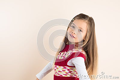 Rapunzel-like little Girl, Posing in Knitted Dress Stock Photo