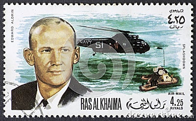 RAS AL KHAIMA - CIRCA 1969: Recovery of Edward Aldrin from Apollo 11 on August 15 1969, postage stamp of 1969 Editorial Stock Photo