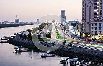 Ras Al Khaimah, United Arab Emirates - March 3, 2018: Ras Al Khaimah Corniche road and creek at dusk Editorial Stock Photo