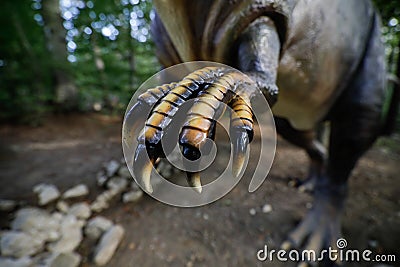 Details with the claws of a dinosaur model at an outdoors dino park in Romania Editorial Stock Photo