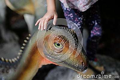 Details with a dinosaur model at an outdoors dino park in Romania Editorial Stock Photo