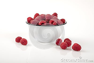 Raspberries in a bowl Stock Photo