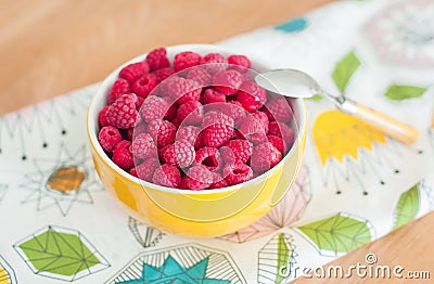 Raspberries on wooden table. Healthy food Stock Photo