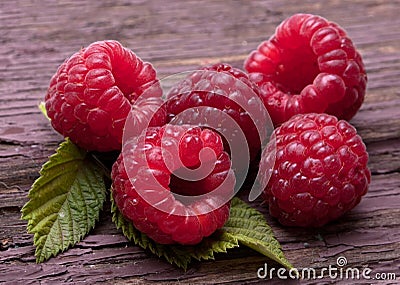 Raspberry fruit on wood Stock Photo