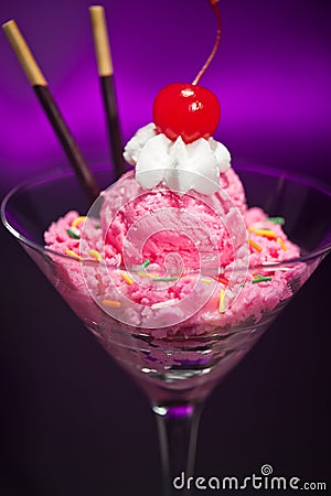 Raspberry ice cream in a Martini glass Stock Photo