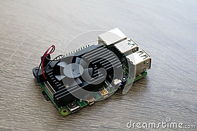 Raspberry Pi Microcomputer 4B with a black heatsink for Electrical Engineering prototyping Editorial Stock Photo