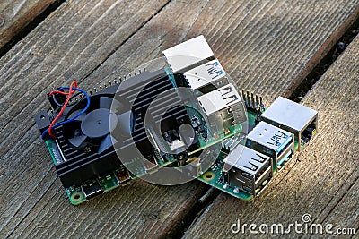 Raspberry Pi Microcomputer 4B with a black heatsink for Electrical Engineering prototyping Editorial Stock Photo