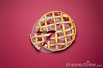 Raspberry pie with a lattice crust and one slice. Summer dessert Stock Photo