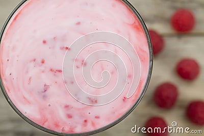 Raspberry smoothie with berries on wooden background. Healthy vegetarian food Stock Photo