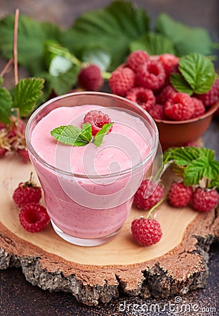 Raspberry smoothie in glass jar. Healthy refreshed homemade beverage. Stock Photo